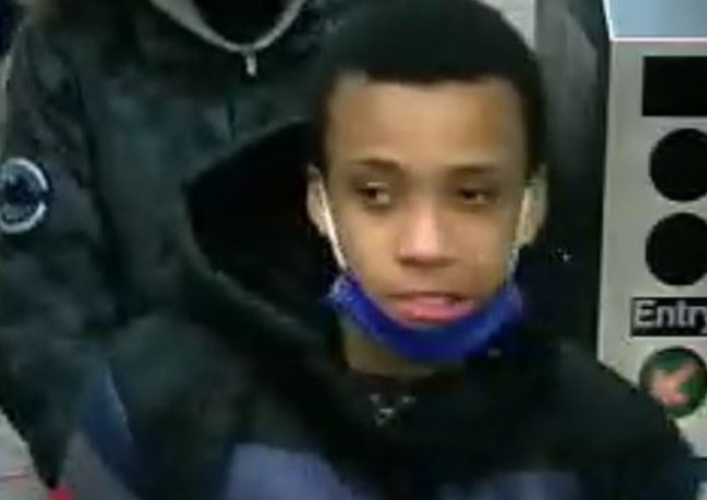 The NYPD released this photo of a man they say is wanted in connection to two burglaries of a UPS store at 71 Broadway.